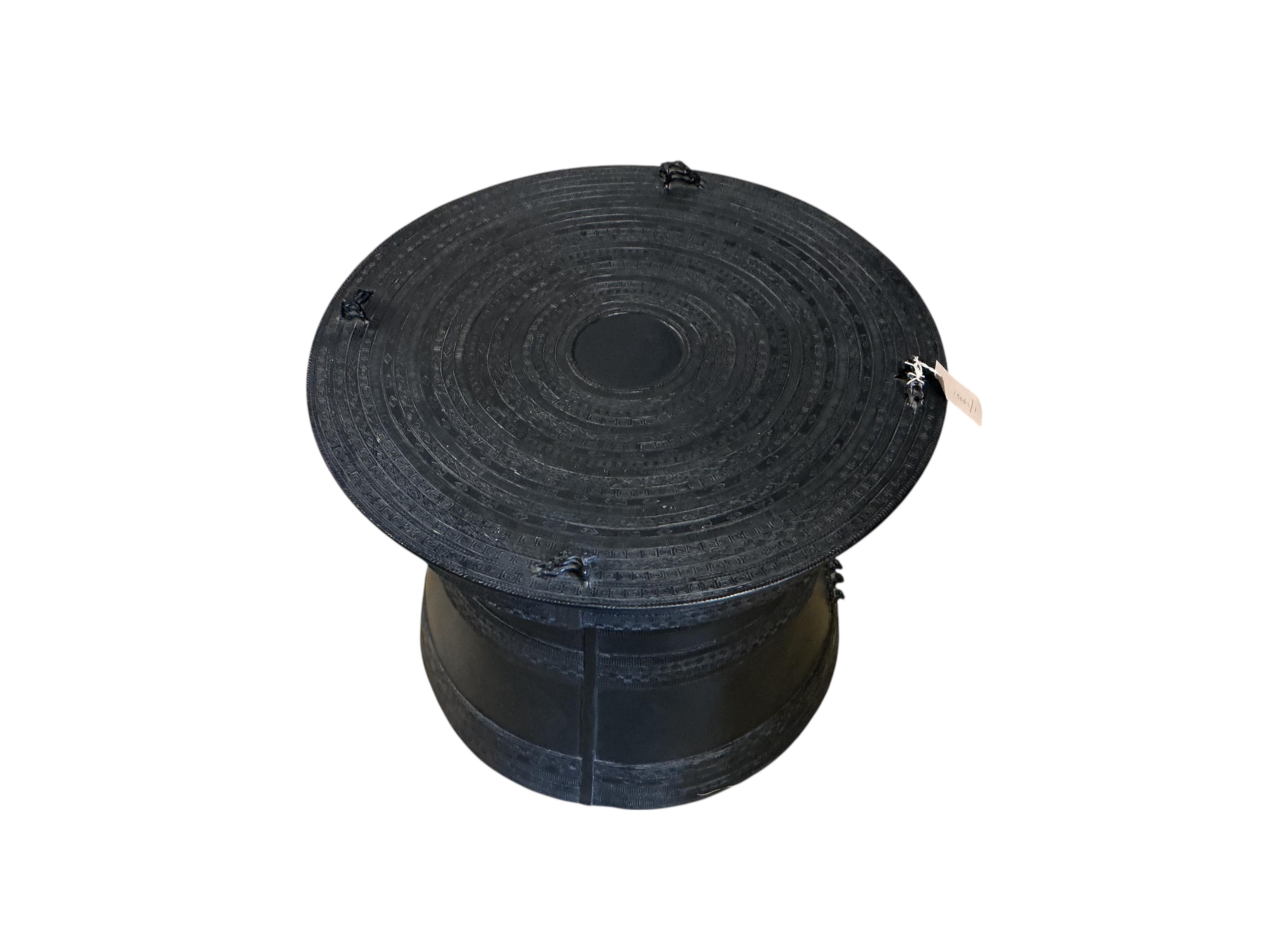 A South East Asian cast metal rain drum table, diameter 62cm, height 48cm